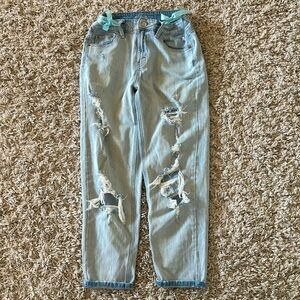 Ripped light blue jeans